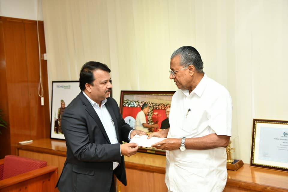 Dr. Hussain handed over Cheque to Chief Minister of Kerala, Shri Pinaray Vijayan as part of his commitment of INR 5 crores towards  Kerala flood Relief Fund at the Chief Ministers chamber at Thiruvananthapuram
